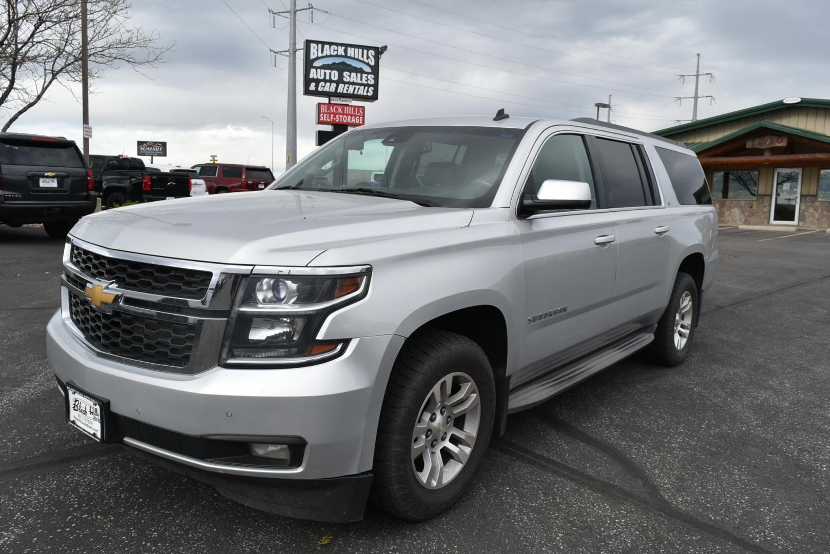 2015 Silver /Gray Chevrolet Suburban LT (1GNSKJKC2FR) with an 5.3L V8 ECOTEC3 WITH Active Fuel Management, Direct Injection and Variable Valve Timing engine, 6-Speed Automatic, Electronically Controlled transmission, located at 1600 E Hwy 44, Rapid City, SD, 57703, (605) 716-7878, 44.070232, -103.171410 - Photo#0