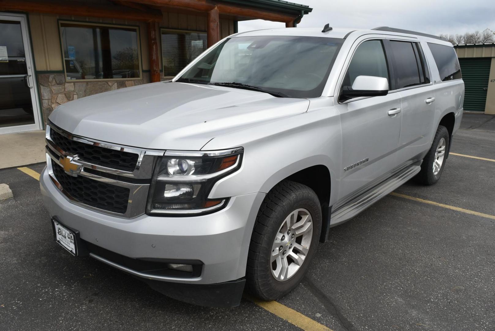 2015 Silver /Gray Chevrolet Suburban LT (1GNSKJKC2FR) with an 5.3L V8 ECOTEC3 WITH Active Fuel Management, Direct Injection and Variable Valve Timing engine, 6-Speed Automatic, Electronically Controlled transmission, located at 1600 E Hwy 44, Rapid City, SD, 57703, (605) 716-7878, 44.070232, -103.171410 - Photo#2