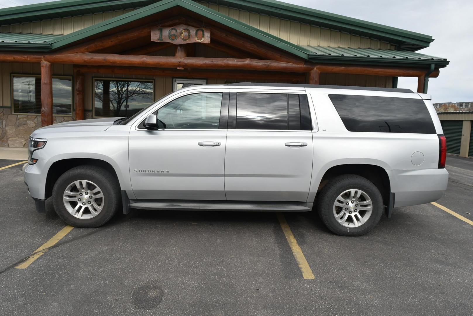 2015 Silver /Gray Chevrolet Suburban LT (1GNSKJKC2FR) with an 5.3L V8 ECOTEC3 WITH Active Fuel Management, Direct Injection and Variable Valve Timing engine, 6-Speed Automatic, Electronically Controlled transmission, located at 1600 E Hwy 44, Rapid City, SD, 57703, (605) 716-7878, 44.070232, -103.171410 - Photo#3
