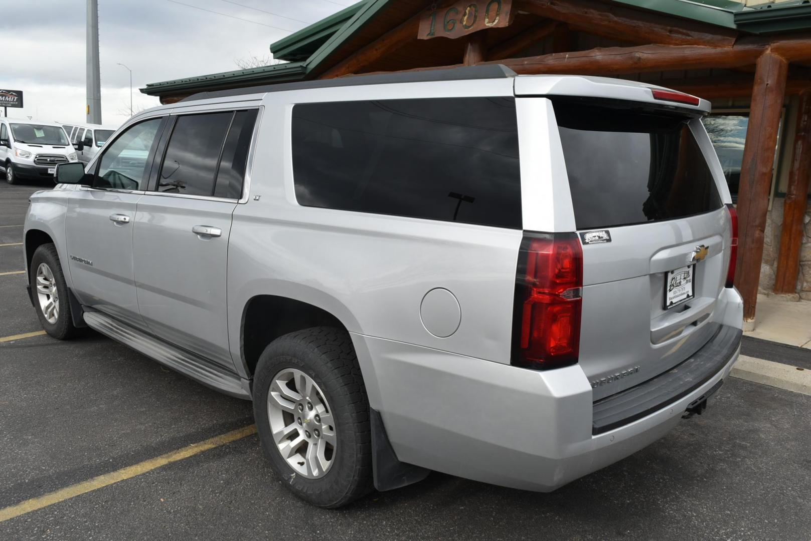2015 Silver /Gray Chevrolet Suburban LT (1GNSKJKC2FR) with an 5.3L V8 ECOTEC3 WITH Active Fuel Management, Direct Injection and Variable Valve Timing engine, 6-Speed Automatic, Electronically Controlled transmission, located at 1600 E Hwy 44, Rapid City, SD, 57703, (605) 716-7878, 44.070232, -103.171410 - Photo#4