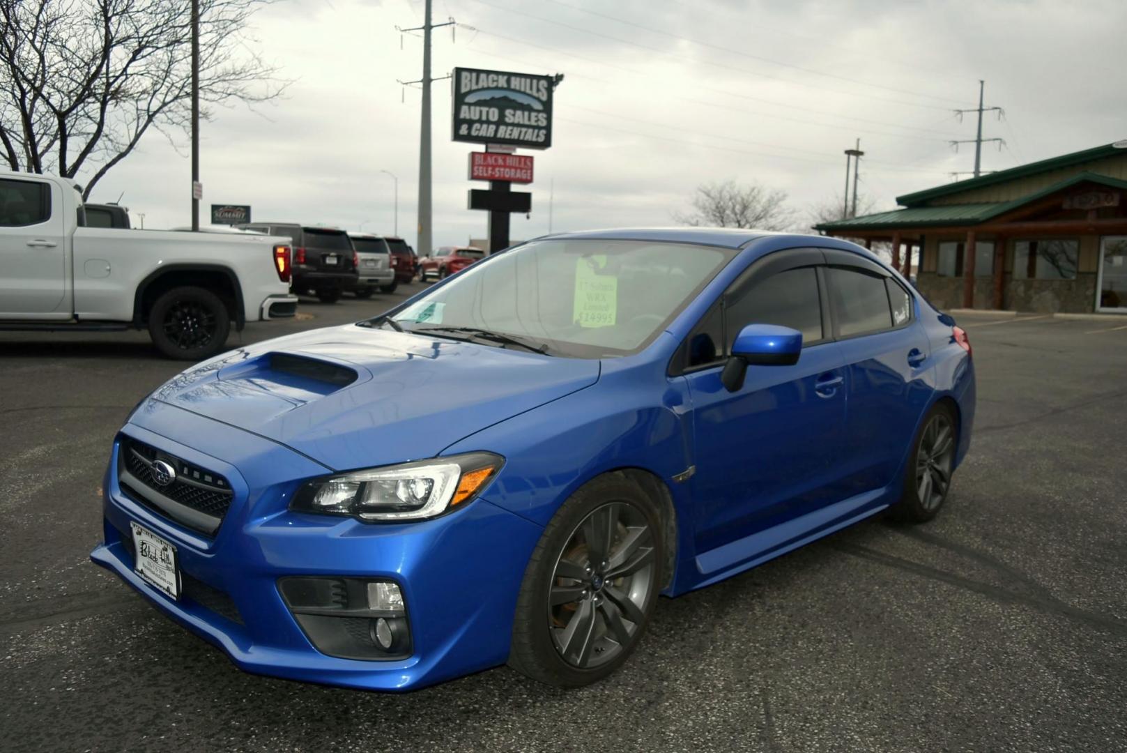 2017 Blue /Black Subaru WRX Limited (JF1VA1J62H9) with an 2.0L H4 Boxer engine, 6-Speed Manual transmission, located at 1600 E Hwy 44, Rapid City, SD, 57703, (605) 716-7878, 44.070232, -103.171410 - Photo#0