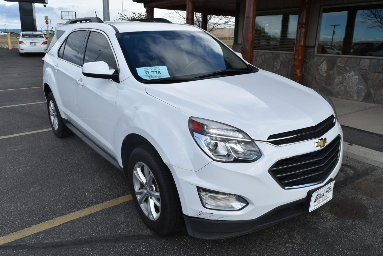 2017 White /Black Chevrolet Equinox LT (2GNFLFEKXH6) with an 2.4L 4-CYL DOHC 16V FFV engine, 6-Speed Automatic w/ Overdrive transmission, located at 1600 E Hwy 44, Rapid City, SD, 57703, (605) 716-7878, 44.070232, -103.171410 - Photo#1