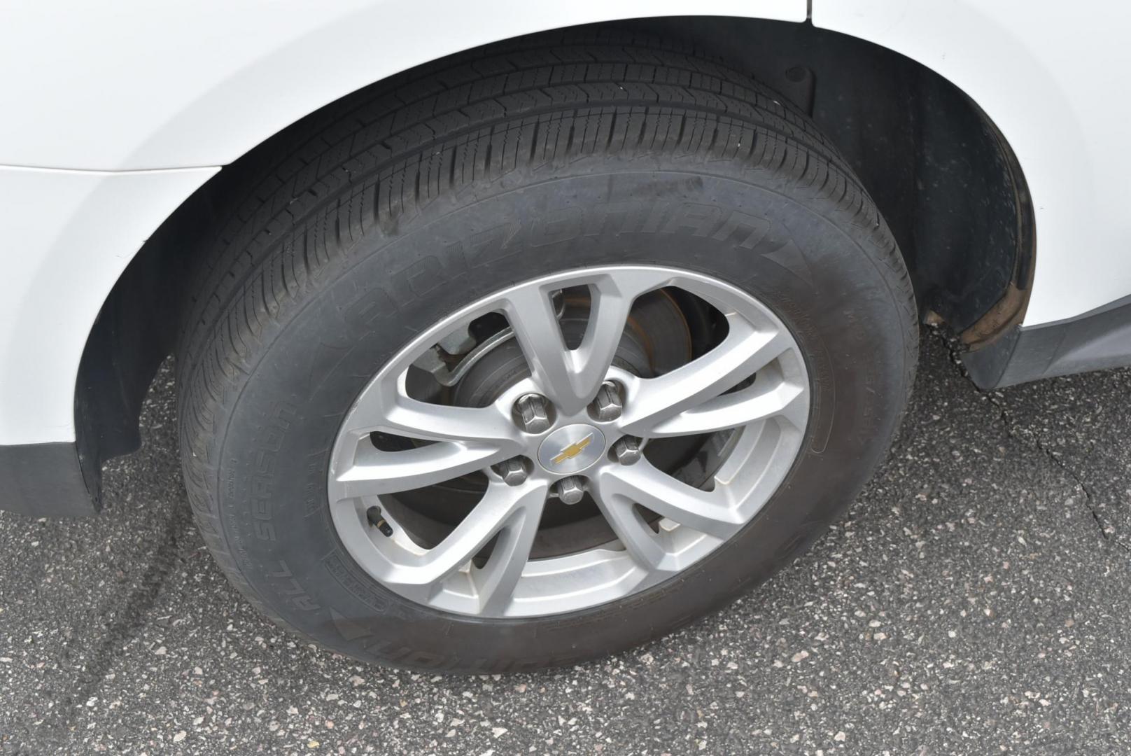 2017 White /Black Chevrolet Equinox LT (2GNFLFEKXH6) with an 2.4L 4-CYL DOHC 16V FFV engine, 6-Speed Automatic w/ Overdrive transmission, located at 1600 E Hwy 44, Rapid City, SD, 57703, (605) 716-7878, 44.070232, -103.171410 - Photo#29