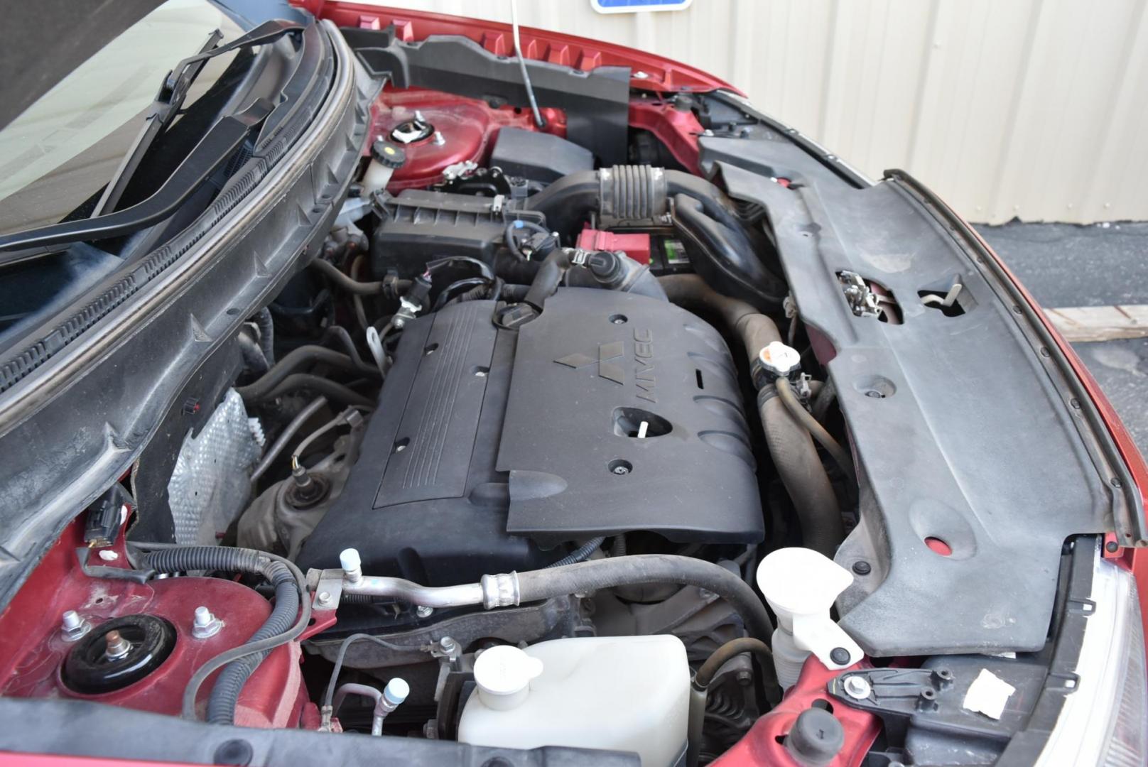 2015 Maroon /Black Mitsubishi Outlander Sport ES (4A4AR3AU8FE) with an 2.0L L4 DOHC 16V engine, 1-Speeed CVT w/OD transmission, located at 1600 E Hwy 44, Rapid City, SD, 57703, (605) 716-7878, 44.070232, -103.171410 - Photo#25