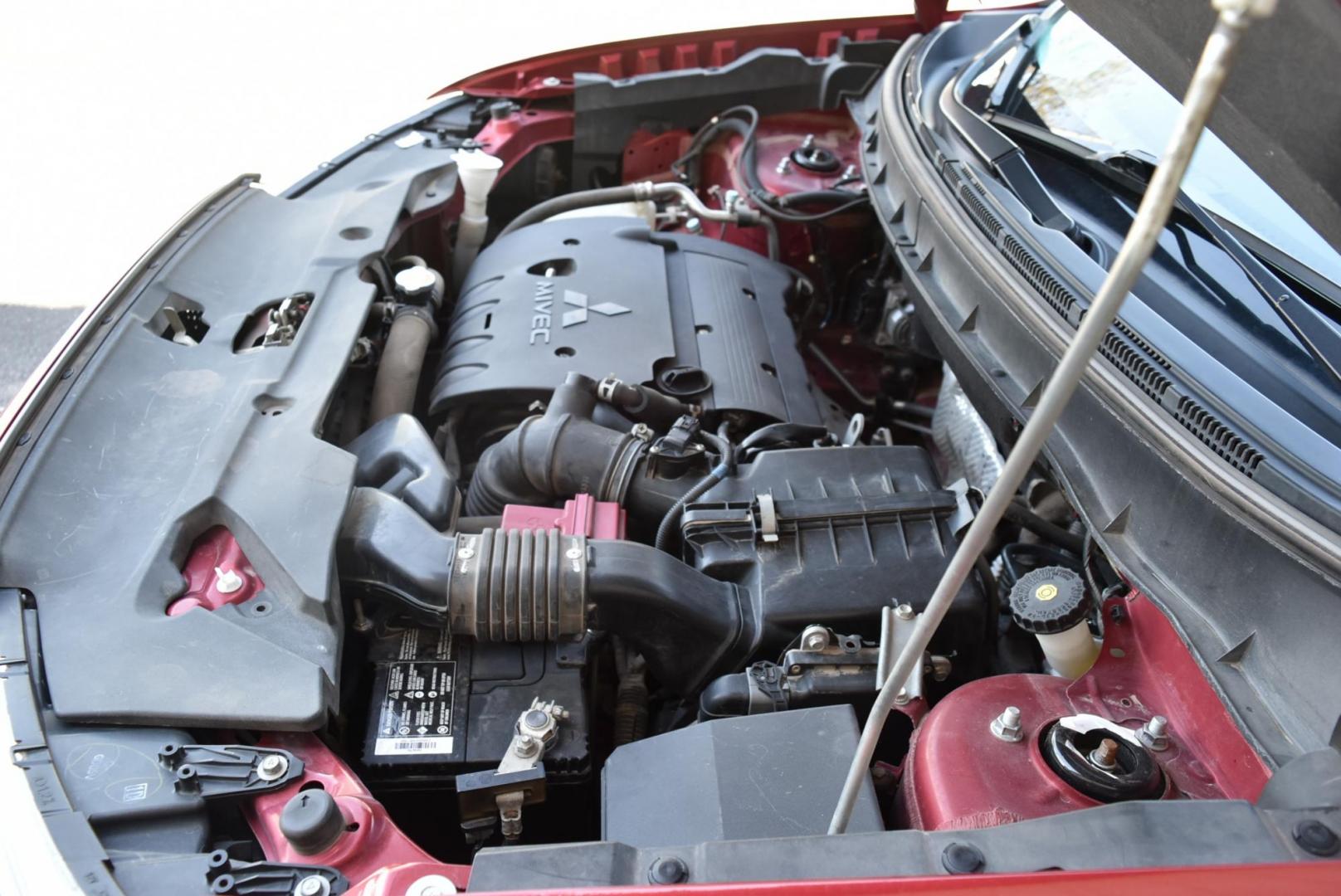 2015 Maroon /Black Mitsubishi Outlander Sport ES (4A4AR3AU8FE) with an 2.0L L4 DOHC 16V engine, 1-Speeed CVT w/OD transmission, located at 1600 E Hwy 44, Rapid City, SD, 57703, (605) 716-7878, 44.070232, -103.171410 - Photo#27