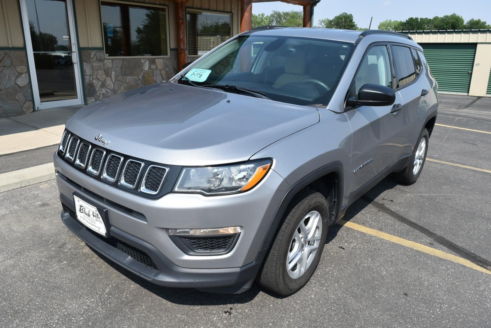 2018 Gray /TAN Jeep Compass Sport (3C4NJDAB9JT) with an 2.4L 4 Cyl MultiAir engine, 9-Speed Automatic transmission, located at 1600 E Hwy 44, Rapid City, SD, 57703, (605) 716-7878, 44.070232, -103.171410- Photo#3