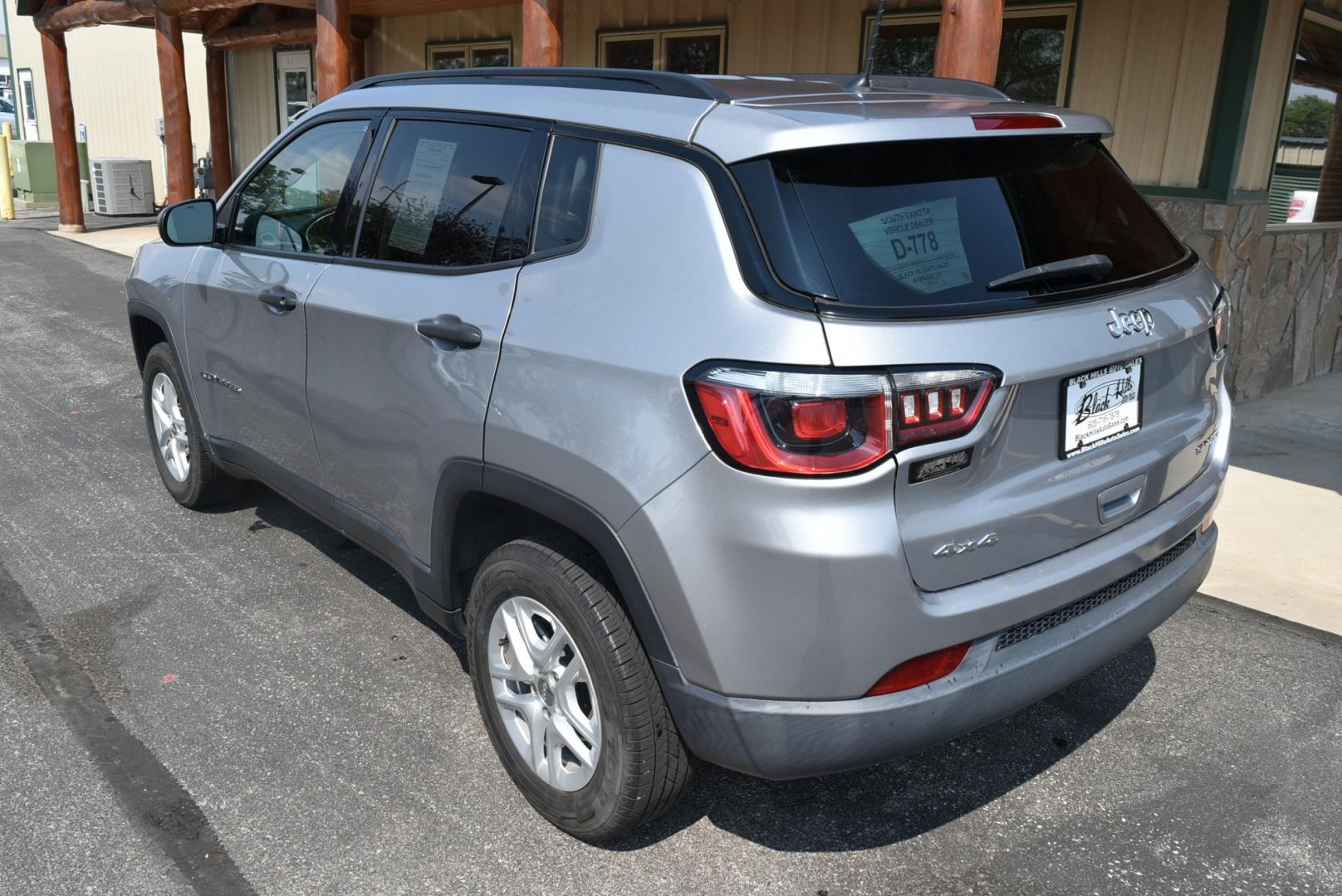 2018 Gray /TAN Jeep Compass Sport (3C4NJDAB9JT) with an 2.4L 4 Cyl MultiAir engine, 9-Speed Automatic transmission, located at 1600 E Hwy 44, Rapid City, SD, 57703, (605) 716-7878, 44.070232, -103.171410- Photo#6