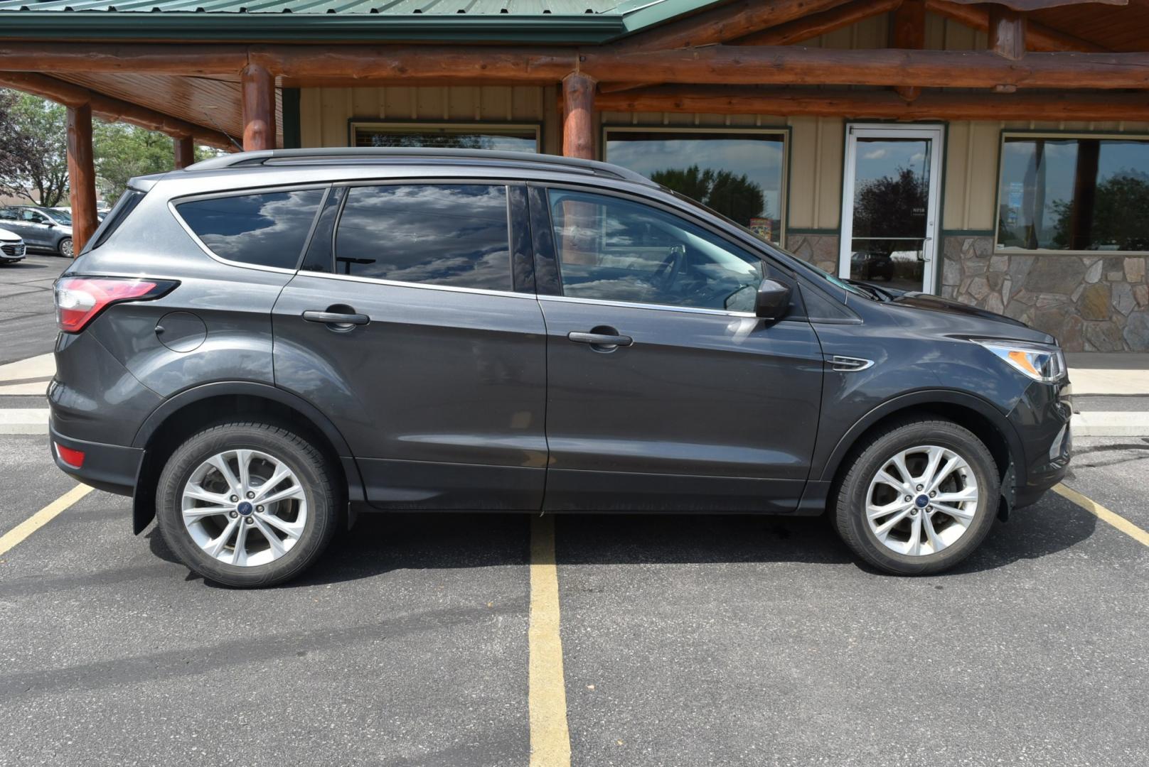 2018 Gray Ford Escape SE (1FMCU9GD6JU) with an 1.5L 4 Cyl Ecoboost engine, 6-Speed Automatic transmission, located at 1600 E Hwy 44, Rapid City, SD, 57703, (605) 716-7878, 44.070232, -103.171410- Photo#5