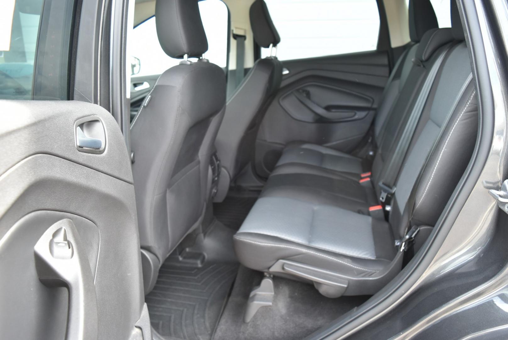 2018 Gray Ford Escape SE (1FMCU9GD6JU) with an 1.5L 4 Cyl Ecoboost engine, 6-Speed Automatic transmission, located at 1600 E Hwy 44, Rapid City, SD, 57703, (605) 716-7878, 44.070232, -103.171410- Photo#12