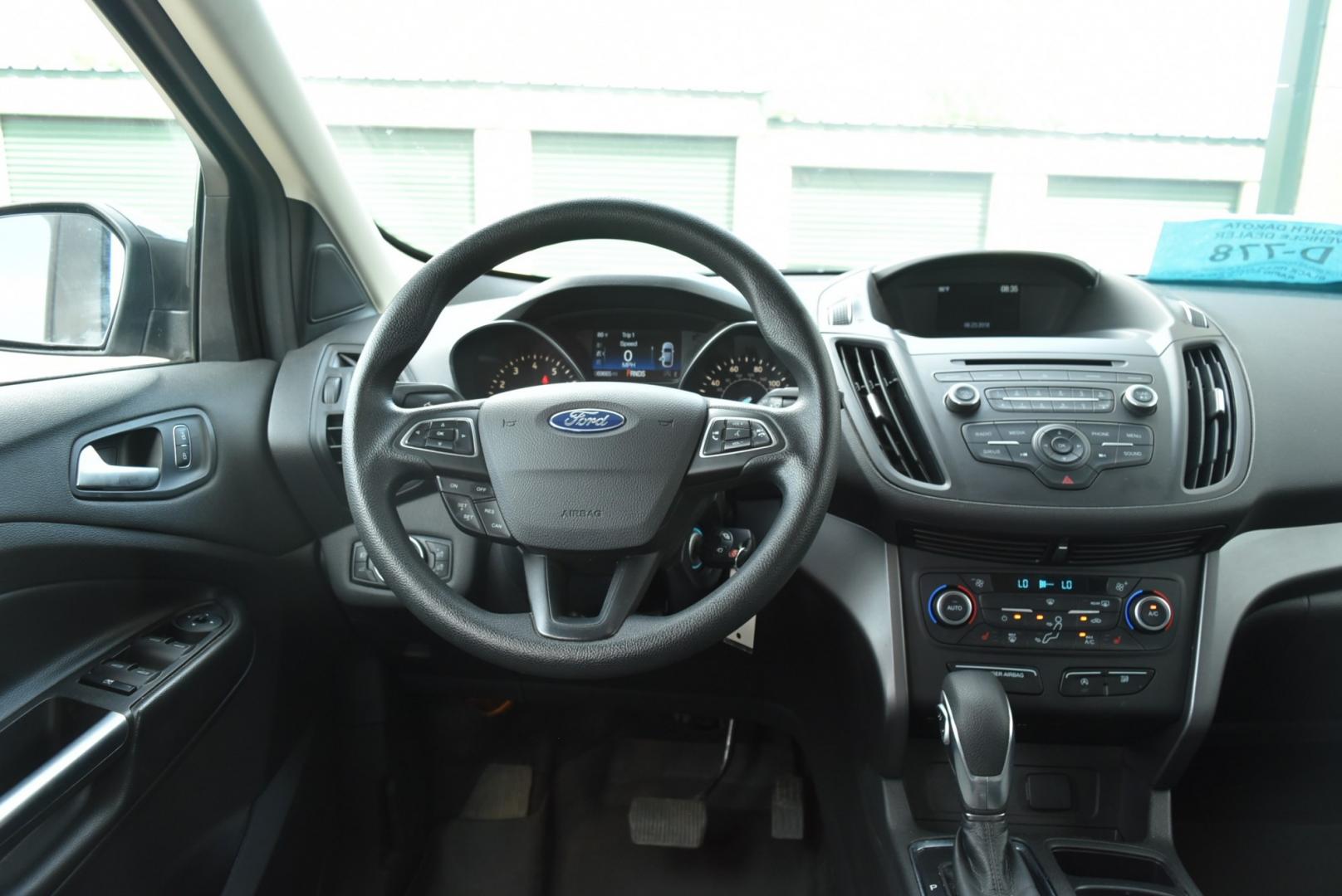 2018 Gray Ford Escape SE (1FMCU9GD6JU) with an 1.5L 4 Cyl Ecoboost engine, 6-Speed Automatic transmission, located at 1600 E Hwy 44, Rapid City, SD, 57703, (605) 716-7878, 44.070232, -103.171410- Photo#13