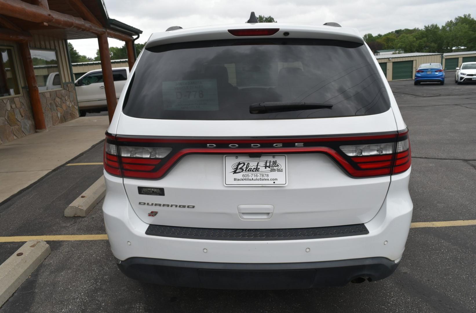 2019 White /Black/Beige Dodge Durango SXT (1C4RDJAG3KC) with an 3.6L V-6 DOHC 24V engine, 8-Speed Automatic transmission, located at 1600 E Hwy 44, Rapid City, SD, 57703, (605) 716-7878, 44.070232, -103.171410- Photo#7