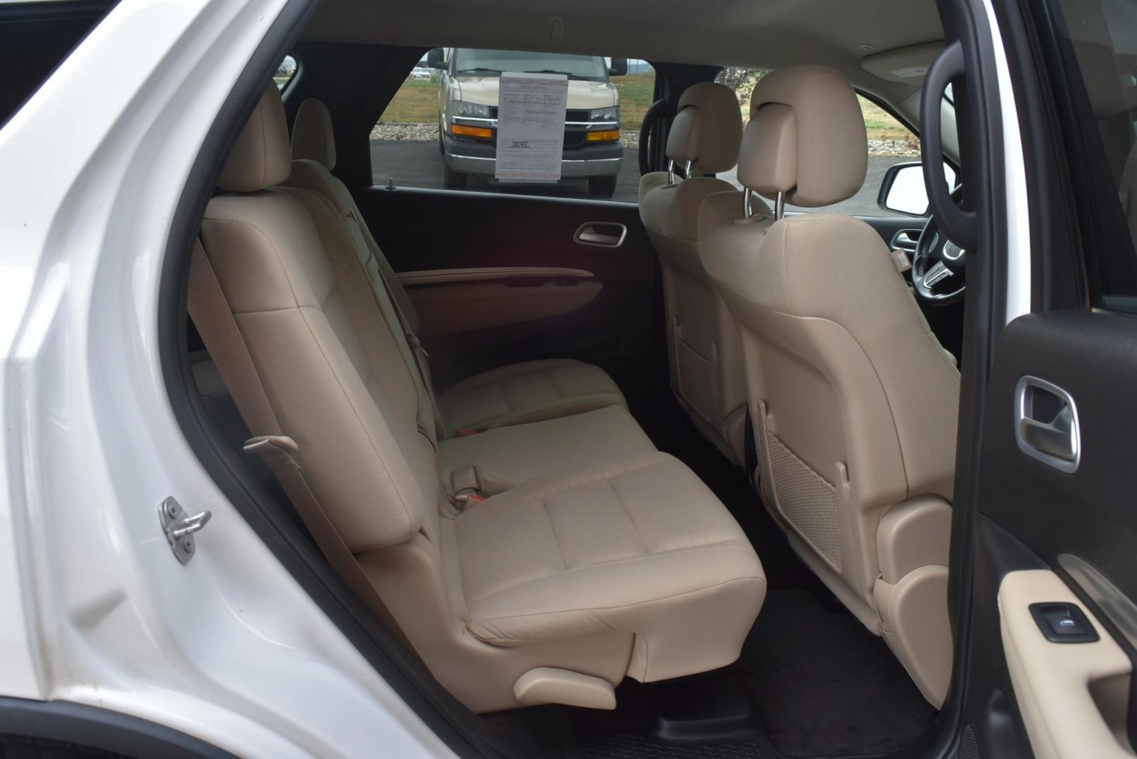2019 White /Black/Beige Dodge Durango SXT (1C4RDJAG3KC) with an 3.6L V-6 DOHC 24V engine, 8-Speed Automatic transmission, located at 1600 E Hwy 44, Rapid City, SD, 57703, (605) 716-7878, 44.070232, -103.171410- Photo#11