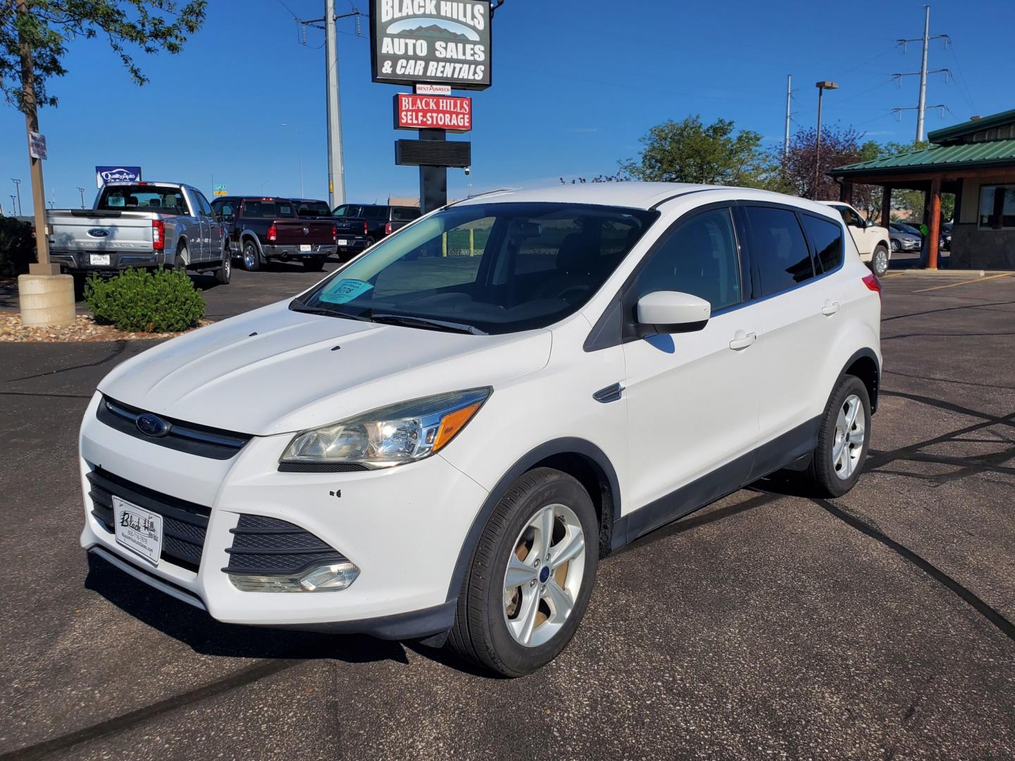 2016 White Ford Escape SE (1FMCU9GX6GU) with an 1.6L 4 Cyl Ecoboost` engine, 6-Speed Automatic W/ Selectshift transmission, located at 1600 E Hwy 44, Rapid City, SD, 57703, (605) 716-7878, 44.070232, -103.171410- Photo#0
