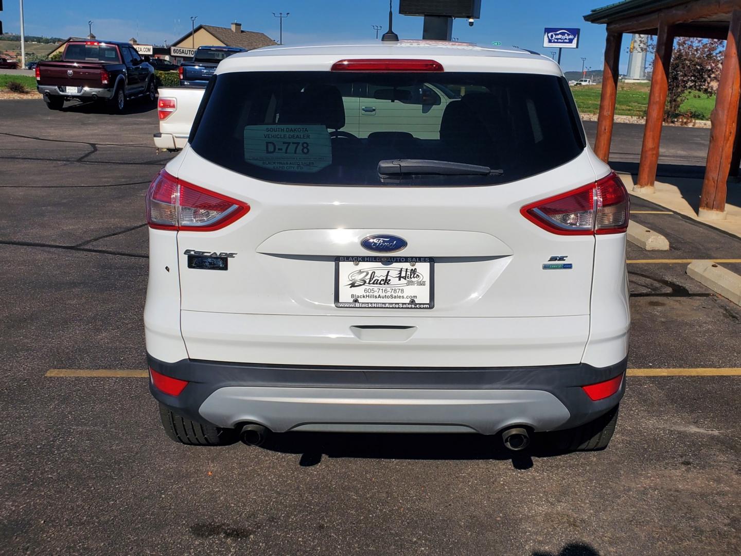 2016 White Ford Escape SE (1FMCU9GX6GU) with an 1.6L 4 Cyl Ecoboost` engine, 6-Speed Automatic W/ Selectshift transmission, located at 1600 E Hwy 44, Rapid City, SD, 57703, (605) 716-7878, 44.070232, -103.171410- Photo#7