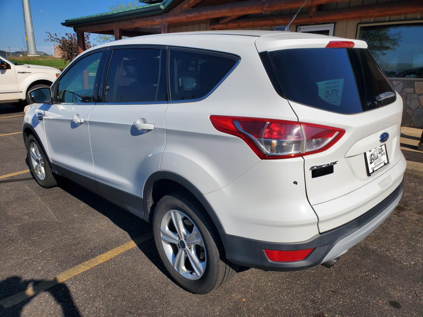 2016 White Ford Escape SE (1FMCU9GX6GU) with an 1.6L 4 Cyl Ecoboost` engine, 6-Speed Automatic W/ Selectshift transmission, located at 1600 E Hwy 44, Rapid City, SD, 57703, (605) 716-7878, 44.070232, -103.171410- Photo#6