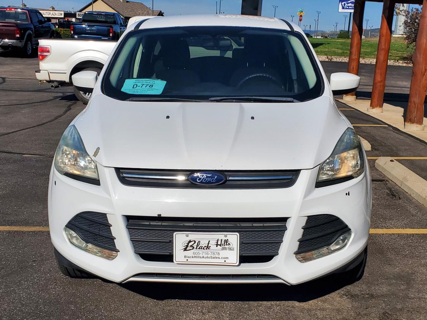 2016 White Ford Escape SE (1FMCU9GX6GU) with an 1.6L 4 Cyl Ecoboost` engine, 6-Speed Automatic W/ Selectshift transmission, located at 1600 E Hwy 44, Rapid City, SD, 57703, (605) 716-7878, 44.070232, -103.171410- Photo#2